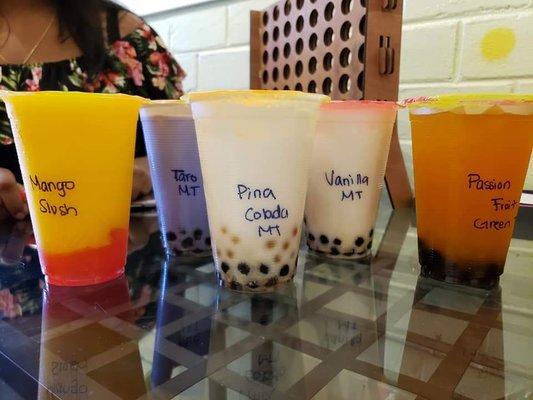 Mango Slush with Strawberry Hearts, Taro Milk Tea, Pina Colada Milk Tea with Unicorn Poop, Vanilla Milk Tea & Passion Fruit Green Tea