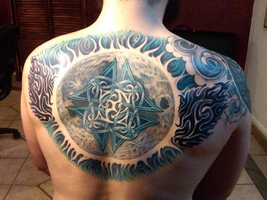 Full moon, glow, wind bars, knotwork, wings. Tattooed by Cpt. Fairbanks.