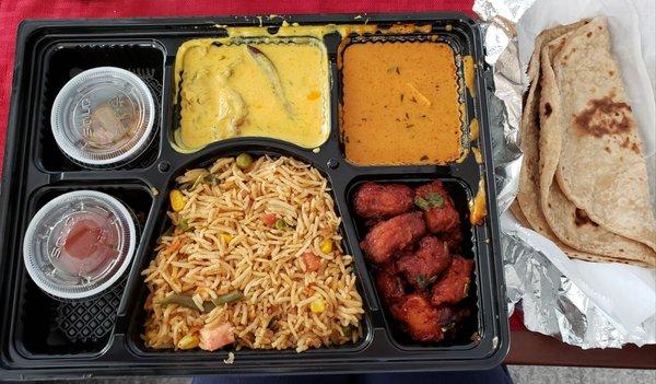 Special Thaali $8.99 Vegetable Biriyani, Punjabi Dahi Kadi, Shahi Paneer, Corn Manchuria, 2 rotis, pickle,  and a gulab jamun.