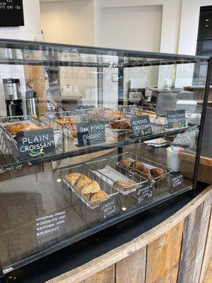 Pastries,  plain, chocolate and almond croissants, blueberry lemon scones and more.