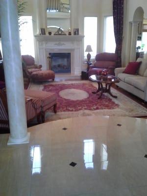 We are fortunate to provide cleaning services to this lovely home.  As you can see, the marble floor has been brought to a br...