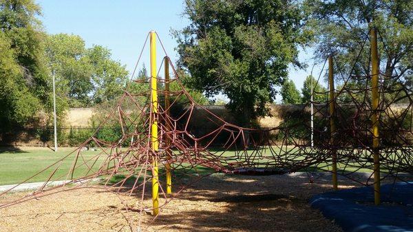 Climbing Structure with trampoline in center