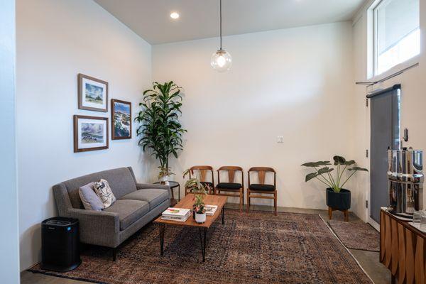 Our comfortable and secure waiting room, complete with tea, La Croix, and snacks.