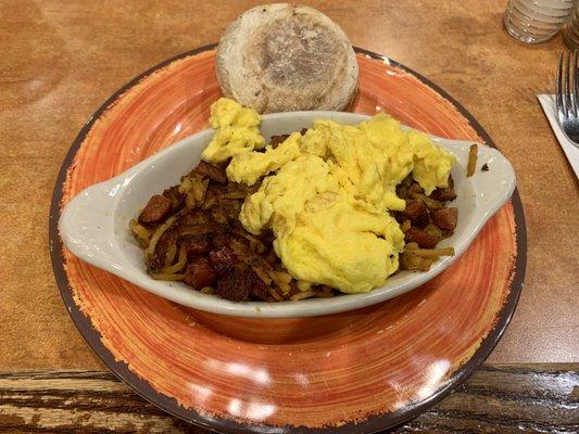 Homemade Andouille Hash and Eggs with a Wolffermans English Muffin.  Excellent & a little spicy.