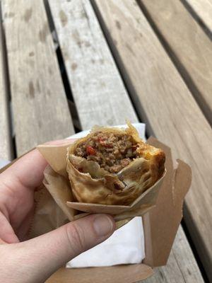 Savory beef empanada.