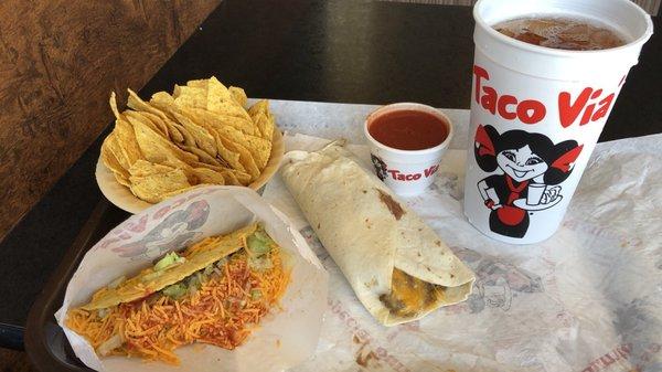 Combo burrito, taco, chips and taco sauce