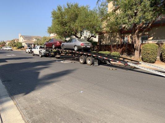 Our vehicles on the open carrier after the cars are loaded