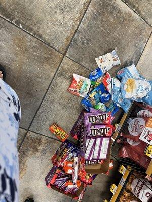 Food thrown on ground during some sort of inventory and then placed back in shelves.