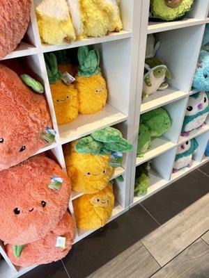 Inside: a rainbow of colorful stuffed friends to be found up in here