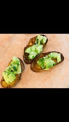 Avocado and cucumber crostini