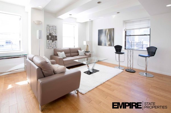 Luxury corporate furnished apartments at Executive Plaza feature fully-equipped kitchens. Empire State Properties | ExecutivePlazaNYC.com