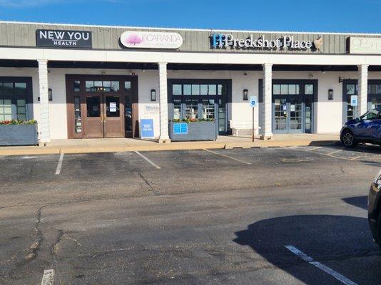 Outdoor View of New You Health, Aesthetic & Sexual Wellness Center. Located in Junction City Shopping Center. Near Jacaranda & Preckshot.