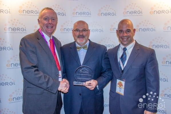 Brian Williams being awarded a safety award from Energi Insurance