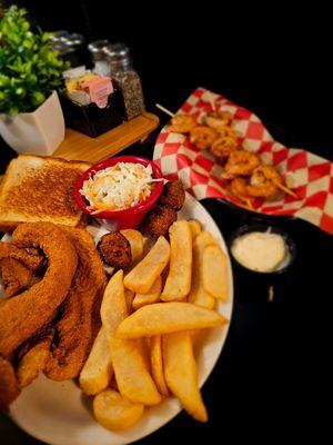 Fish dinner served with 2 sides