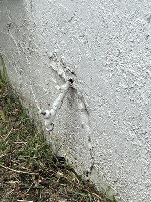 Pipe that plumber broke by placing his body weight on the pipe to look at it closer without bending his knees.