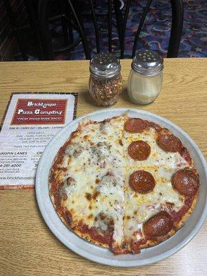 9 inch 1/2 pepperoni 1/2 sausage lunch special.  Delicious. Very feeling. Toppings all the way to the edge.