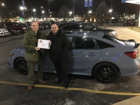 Me (on left) with Cory Gonzales of Community Honda of Orland Park taking delivery of my 2022 Honda Civic SI.