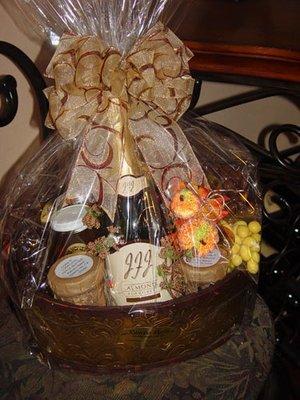 Gift Basket Sample: Gourmet Almonds, Chocolates, Jelly's, Honey and Champagne.