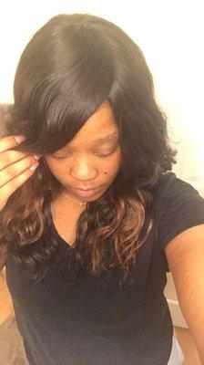 Custom wig with natural looking part and bangs.