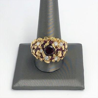 Men's diamond and garnet ring.