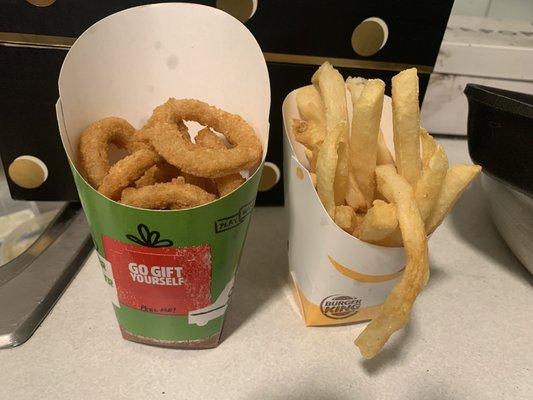 Apparently a "large" onion ring and a small fly ordered on the same order. Y'all suck!