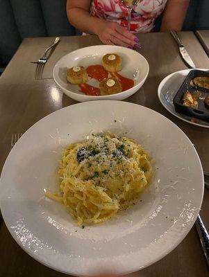 Crab carbonara and crab cakes