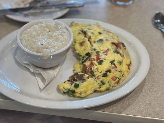 Build Your Own Omelet or Scramble and Side of Grits