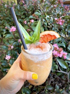 Experience tropical bliss with our Floor is Guava cocktail, crafted with three rums, guava, orgeat, pineapple juice, lime, and bitters