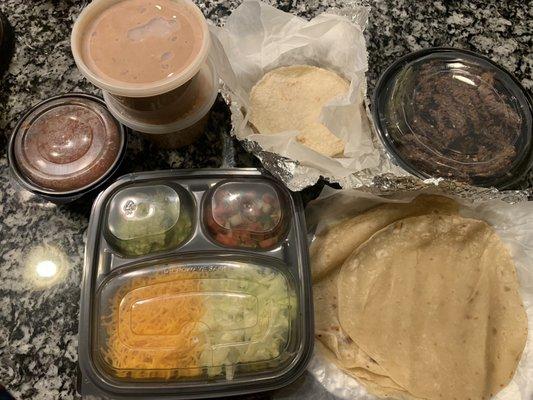 Fajitas For 4 - beef set with both corn and flour tortillas. Larger flour tortillas on bottom right had strange doughy texture.