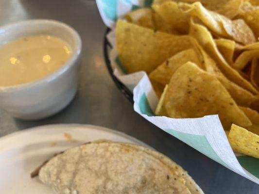 Chips and queso. Grilled portabella taco.