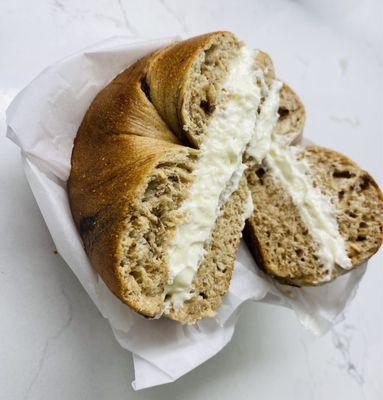 Cinnamon raisin bagel, toasted, with regular Philly cream cheese.