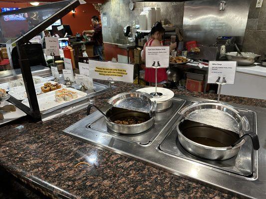 Soups at the appetizer station.