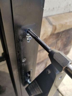 Tapping damaged aluminum threads to reattach a Jackson 1085 exit device