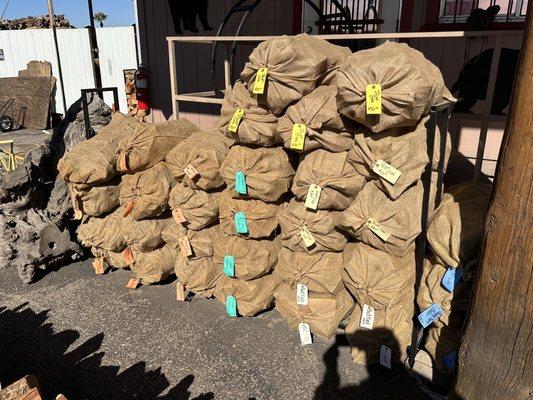 Bags of wood with prices