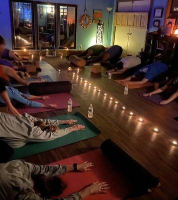 Join us for gentle candlelight yoga!