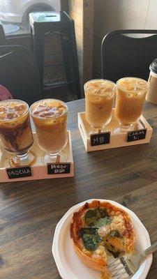 Spinach quiche and iced coffee flight. Yummy!