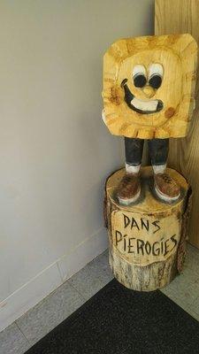 Dans pierogies wooden mascot.