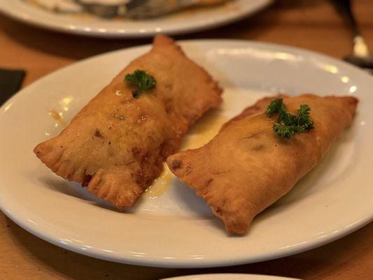 Haitian Pate with ground beef filling, so juicy and flavorful! My favorite bite.