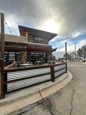 Front of 212 Pizza Company and view of their outdoor patio area