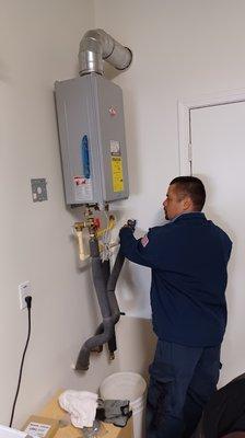 Paco Installing Water Heater Pipes