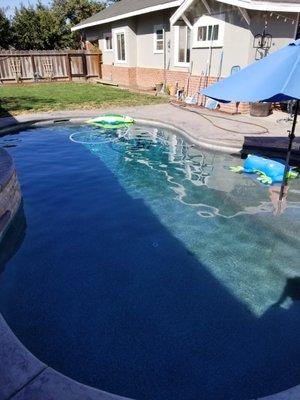 Residential swimming pool in Modesto after pool service.