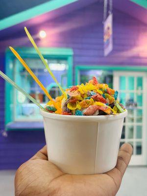 Rum and raisins ice cream topped with fruity pebbles