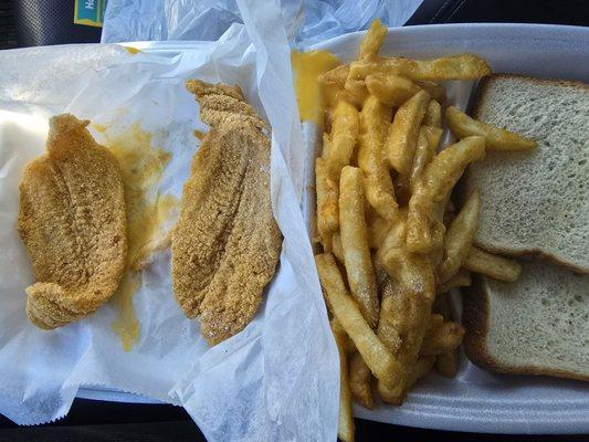 Small catfish dinner with cheese fries and bread