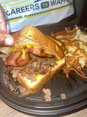 Texas bacon cheesesteak melt plate with hashbrowns