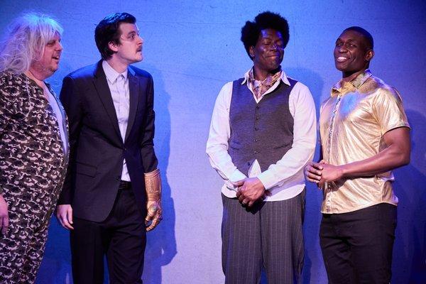 Actors (left to right): Derek Humphrey, Bret Raybould, Dean Edwards, and Justin Dinkins on stage at SoHo Playhouse.