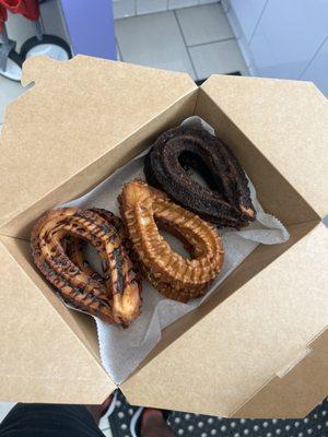 This the spells box, three different flavors, six mini churros