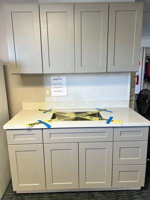 Cabinets and countertop by Grand Construction Supply