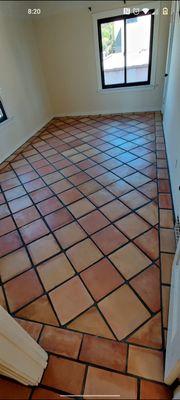 Removed carpet and installed Spanish tile throughout the house.