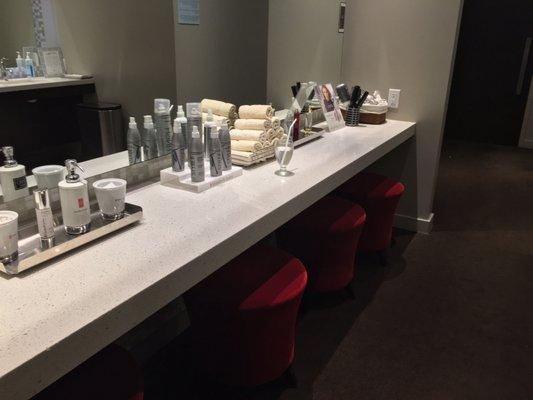 Inside of the woman's changing room. Stocked with everything from hair supplies to mouth wash.