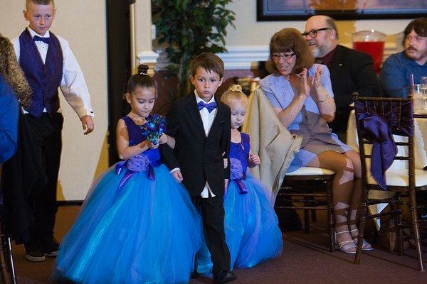 Two flower girl dresses made from just a picture I brought in.  Three layer dresses and she made them with speed, accuracy, and high quality